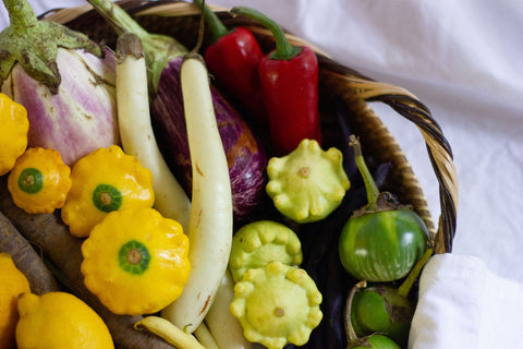 fresh vegetables in a handwoven basket